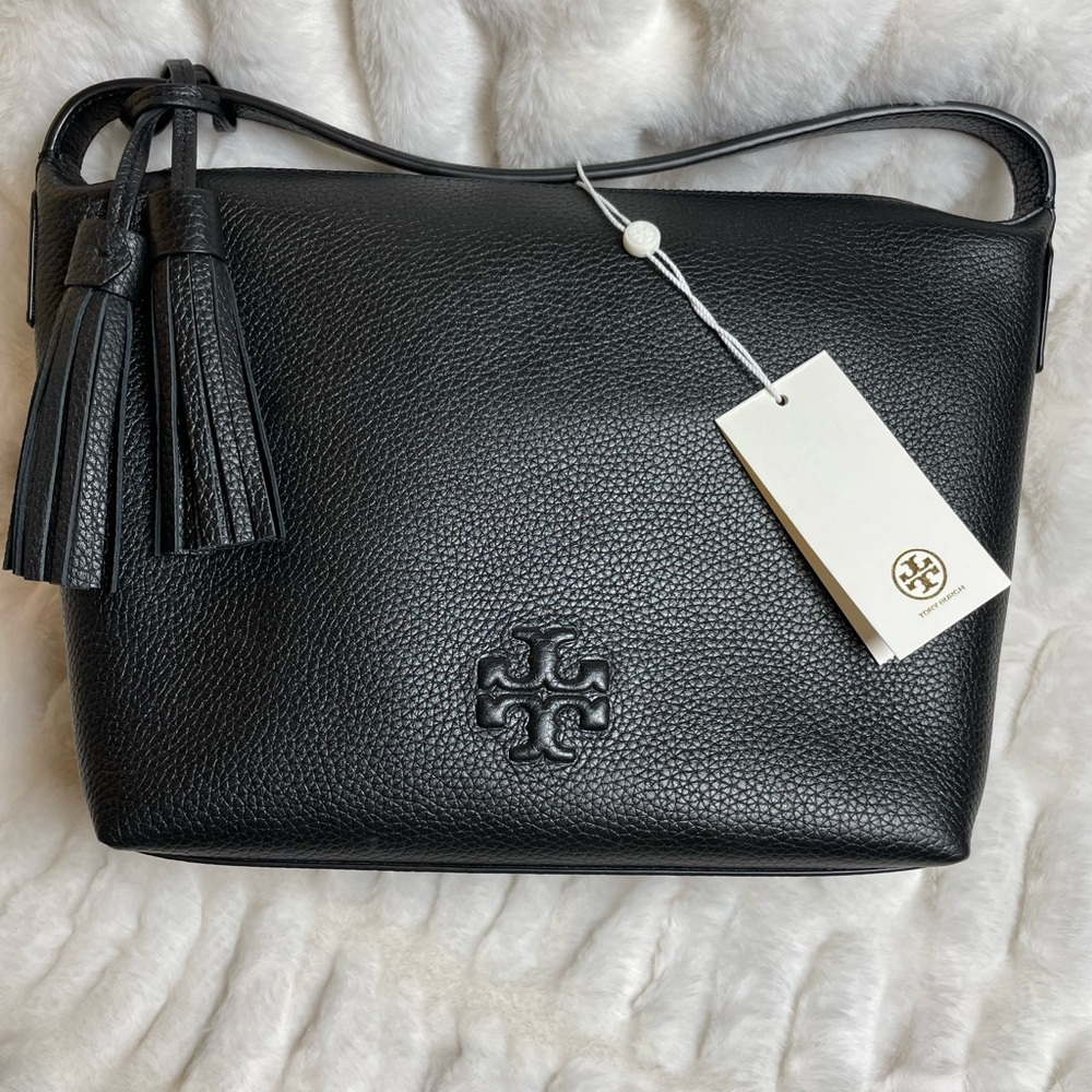 Tory Burch, black pebbled, leather shoulder bag with tassels NWT and dust bag